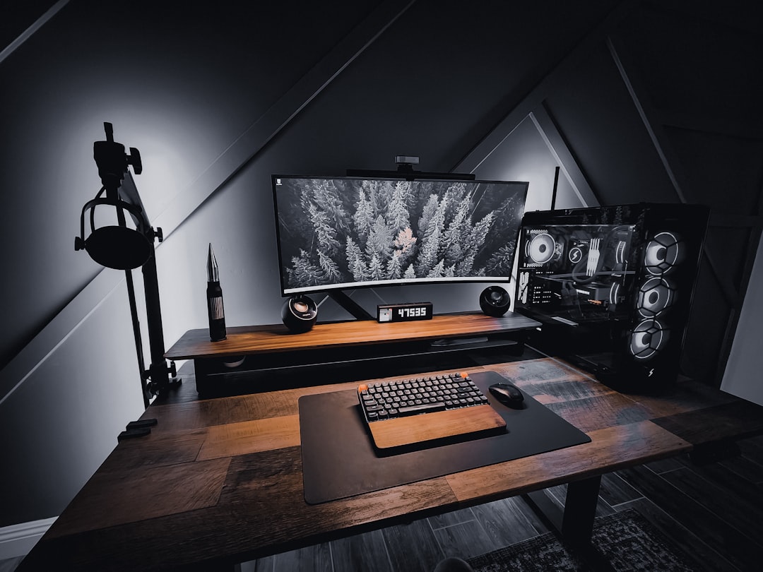 A gamer adjusting audio settings on a headset while playing a video game in a cozy gaming environment.