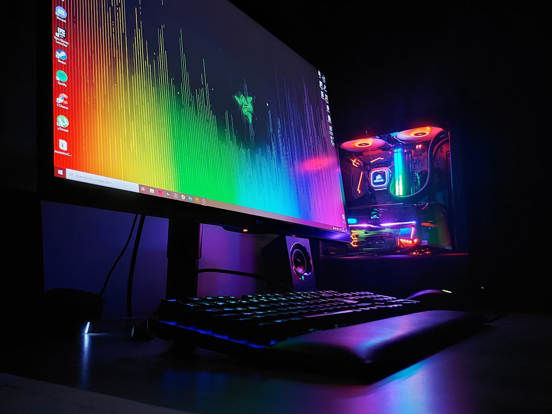 A modern gaming setup featuring a high-performance PC, gaming console, and accessories like a headset and keyboard, set in a stylish room environment.